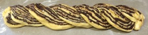 Twisted strips of Chocolate Babka Dough to form a loaf