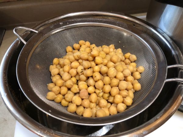 Using a strainer drain the Garbanzo Beans or Chickpeas.