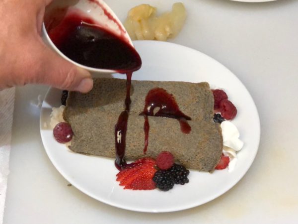 Drizzle the Black Raspberry Glaze over crepes.