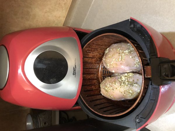 Placed the Spinach Stuffed Chicken Breasts carefully into basket of the Air Fryer. Set the Air Fryer to chicken setting. Using the PowerXL default setting 20 minutes at 350°F.