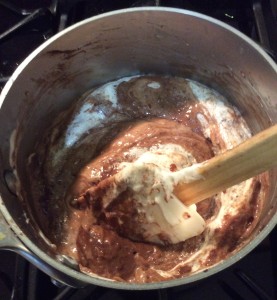 Folding meringue into tapioca pudding.