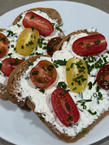 Toasted mulit grain sourdough bread with Chive garlic ricotta spread